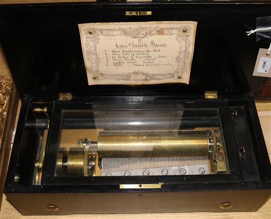 A Swiss six air Etouffoirs en Acier cylinder music box, no. H8020, with part hand-written label, in inlaid rosewood and ebonised case